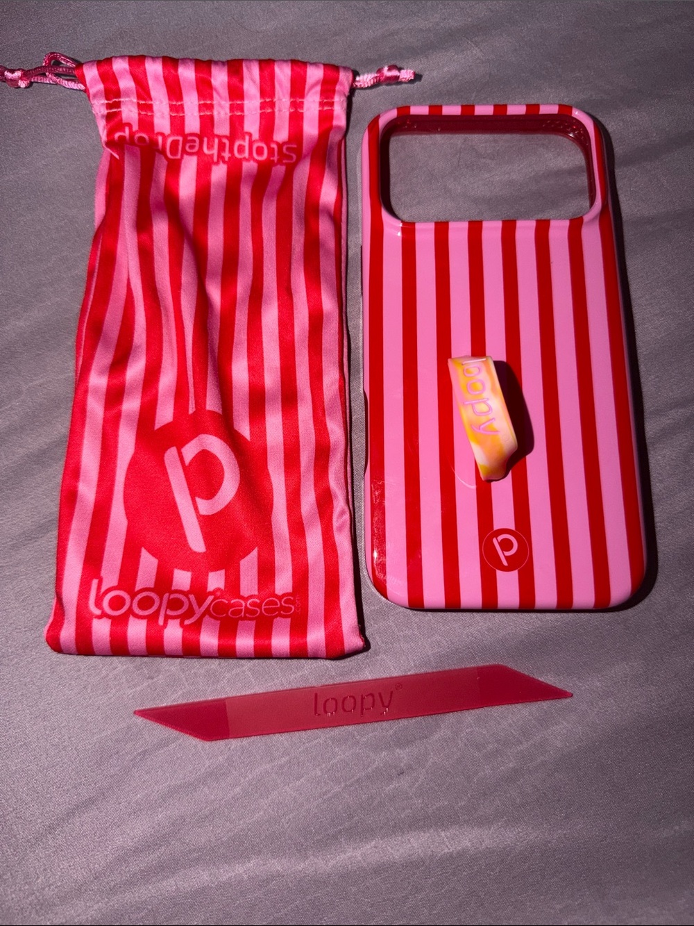 NEW iPhone 17 pro max red and pink striped loopy case with drawstring pouch